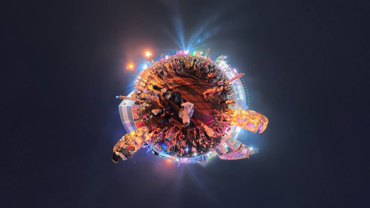 Night live-event 360 frame above a crowd