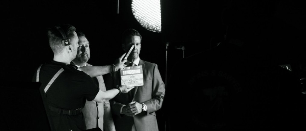 Camera operator filming a presenter