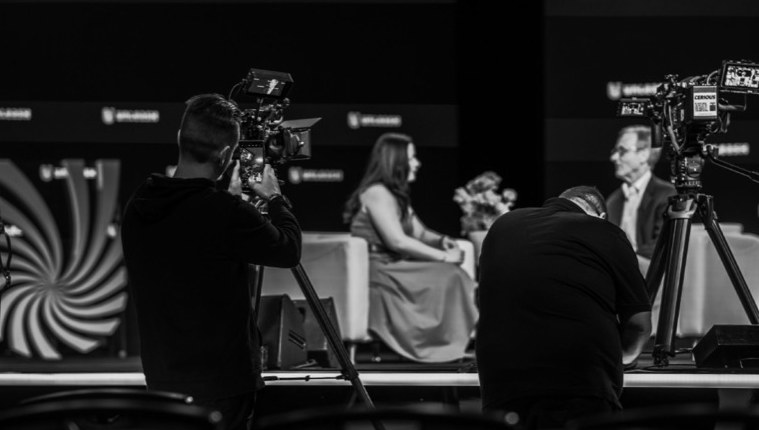 Crew and camera during a live event
