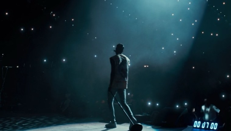 Performer in a spotlight